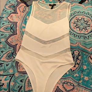 Cute see through onsie never worn